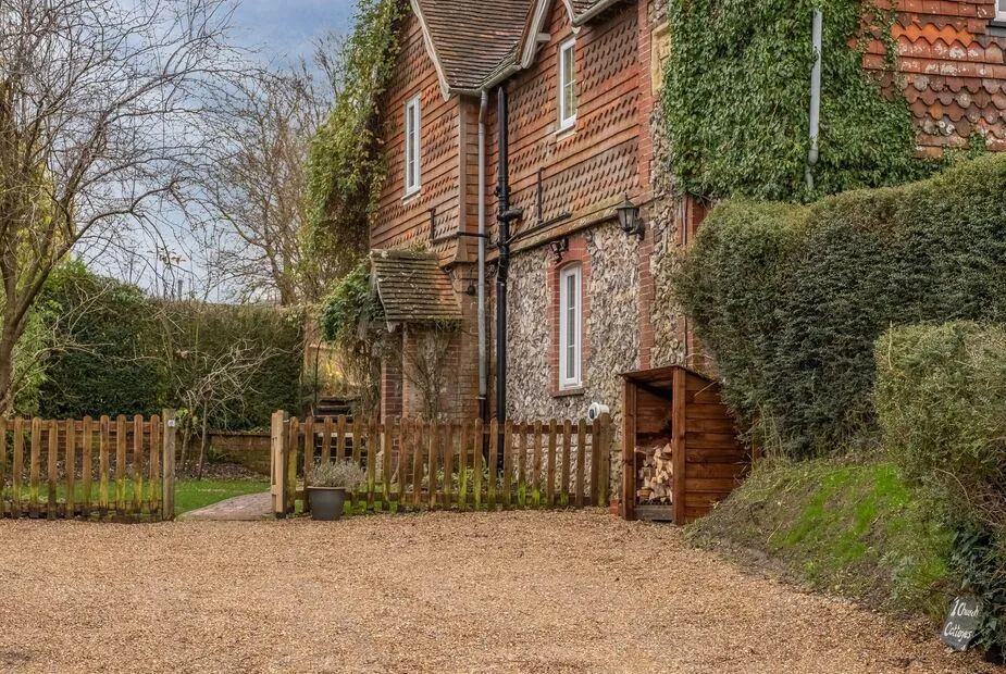 1 Church Cottages flint and tile-hung cottage with gravel drive