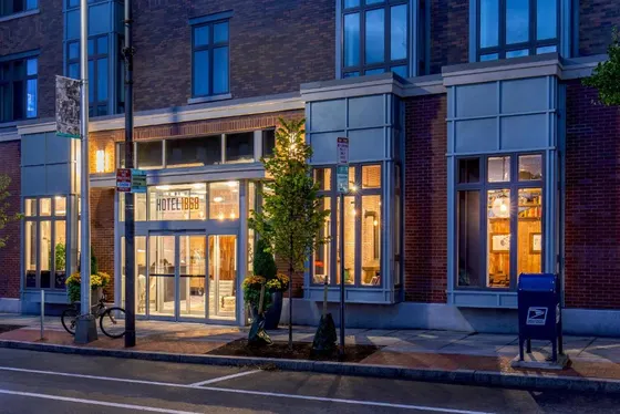 Store front of a brick building with glass windows