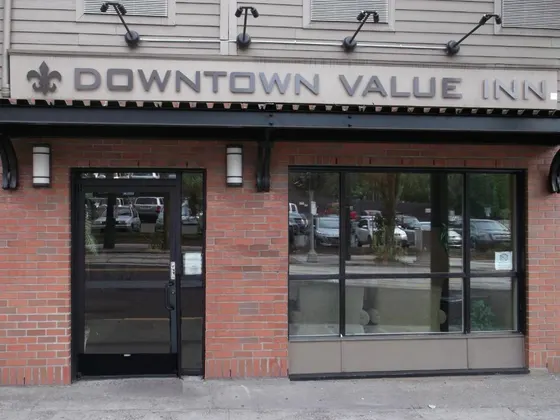 Building with a window value initiative sign on it