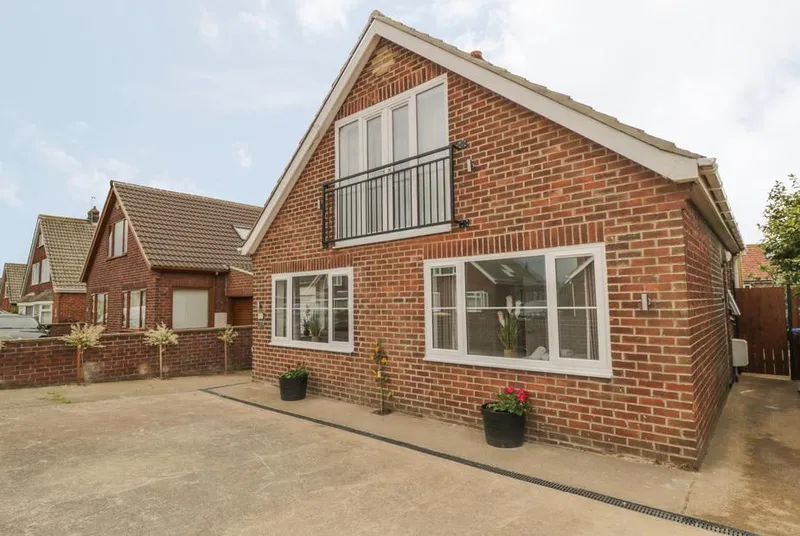 Abbey View contemporary property exterior with driveway
