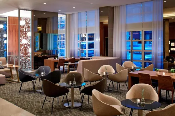 Restaurant with tables and chairs in a building