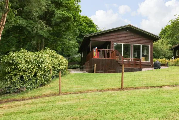 Kipling Lodge front elevation with timber deck and large windows