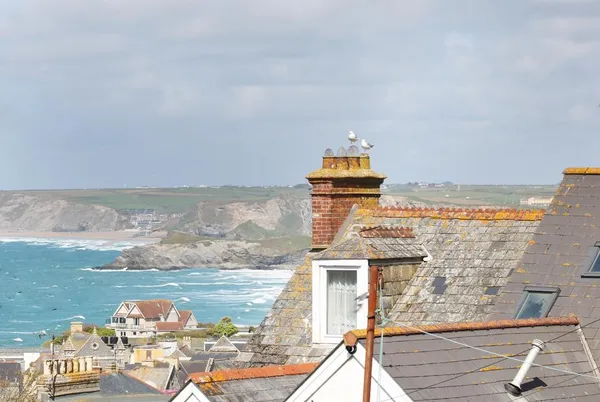 An Drowes rooftop and sea-context view over Newquay
