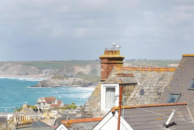 An Drowes rooftop and sea-context view over Newquay