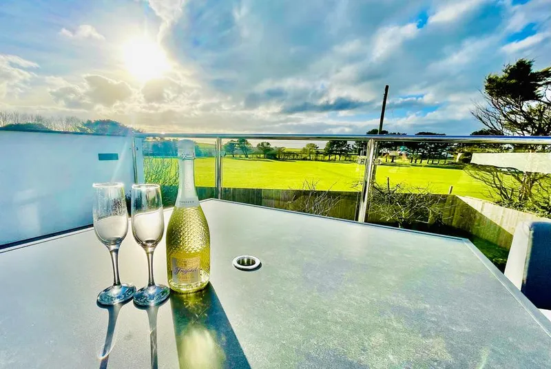 Avalennek hot tub terrace with open rural views