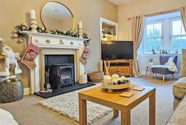 Balmore Farmhouse living room with fireplace