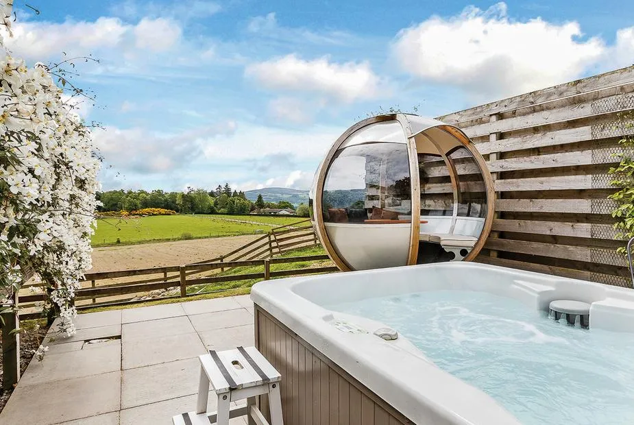 Beauly Lodge hot tub and pod seat with countryside views