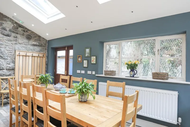 Ty'n y Cae stone walled kitchen dining space