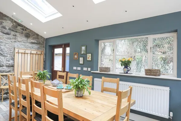 Ty'n y Cae stone walled kitchen dining space