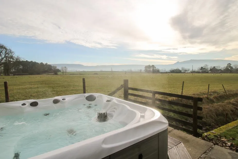 Bicton Lea hot tub with open field views