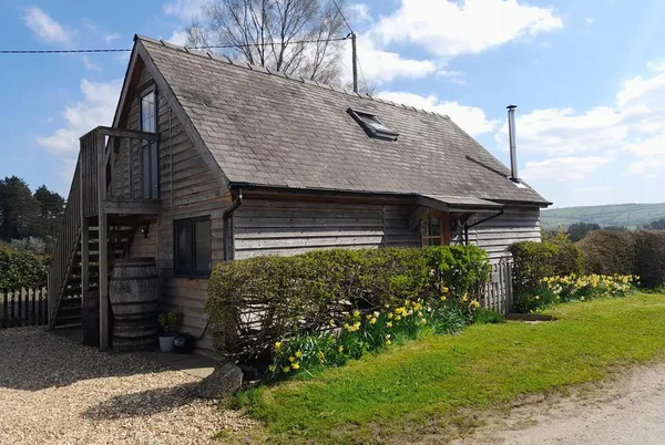 Bicton Lodge lodge exterior on the hillside