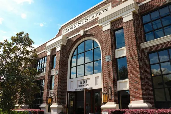 Red brick building with a Basin St. Station sign