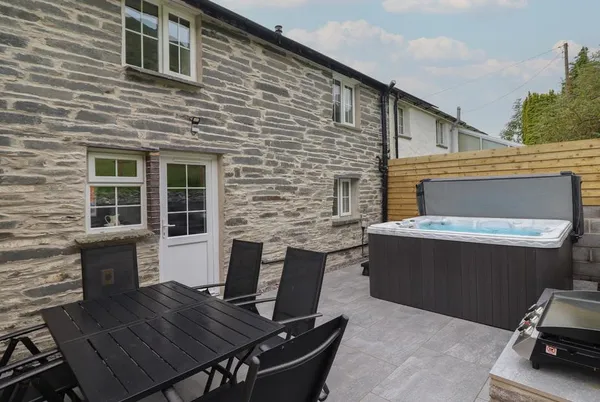 Bwthyn Camlan rear stone cottage with hot tub terrace