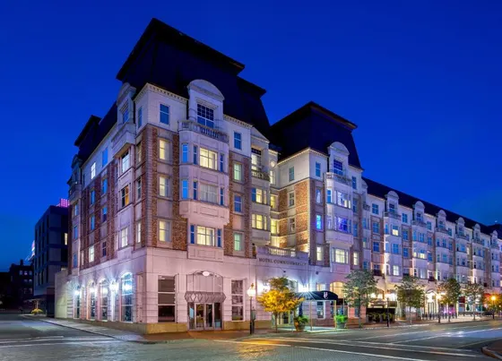 Large building on a city street at night