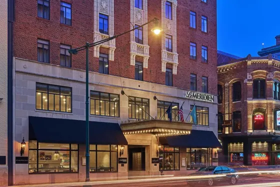 Brick Le Meridien at dusk next to St. Elmo