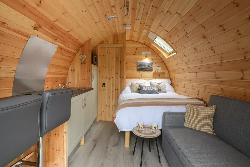 Caban Tirion compact pod interior with bed and kitchenette