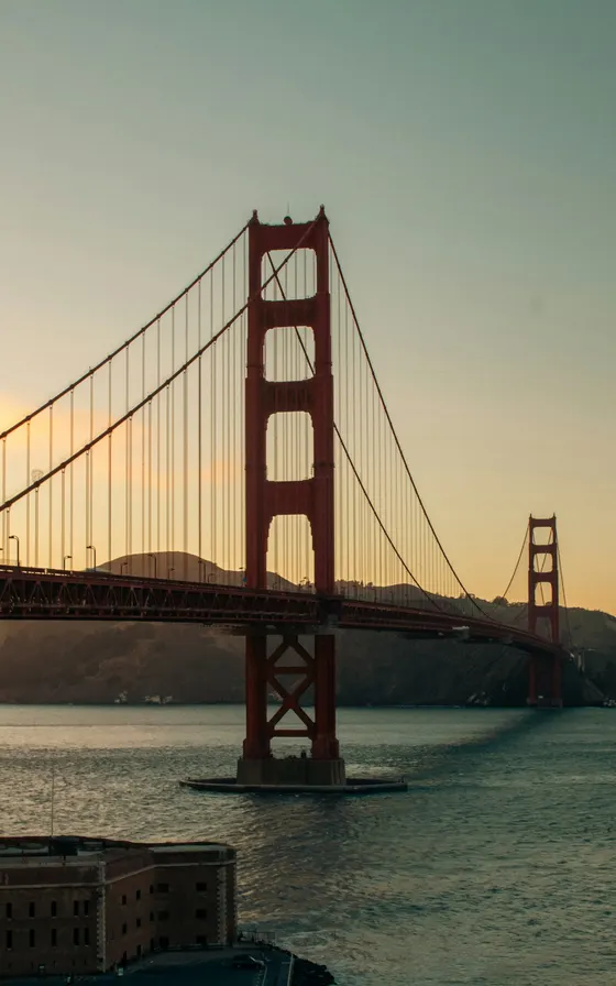 Golden Gate Bridge over the bay at sunset