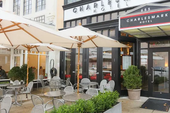 Outdoor cafe with tables and chairs and umbrellas