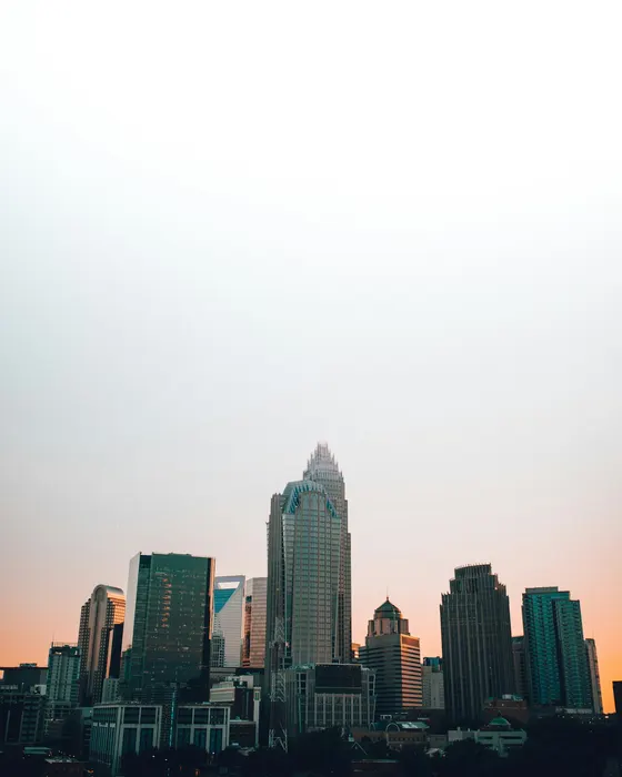 Uptown Charlotte skyline in soft sunset light