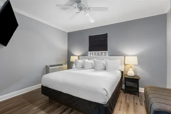 Bedroom with a bed and a couch
