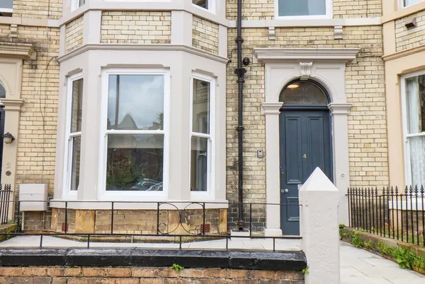 Church View Victorian stone front facade with arched door