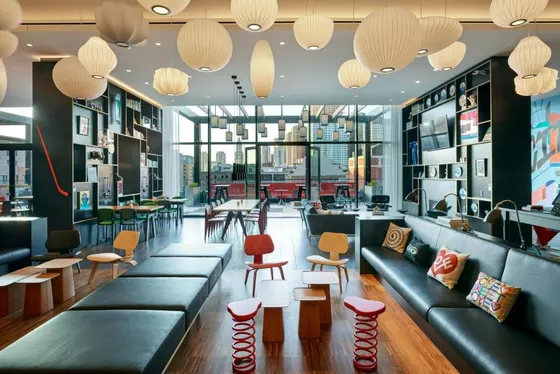 Restaurant with a couch and chairs and tables