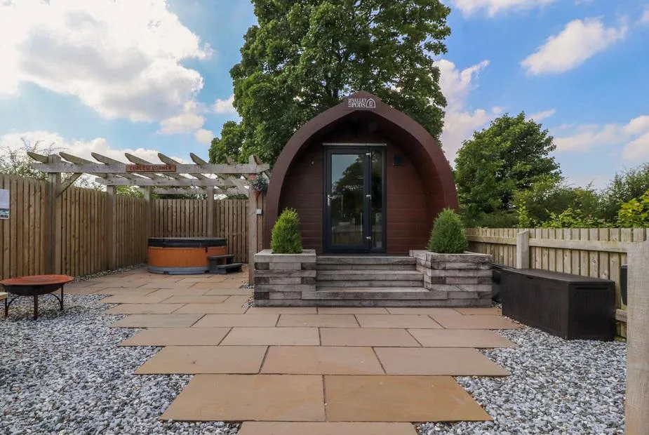 Curlew Corner glamping pod with the hot tub on deck