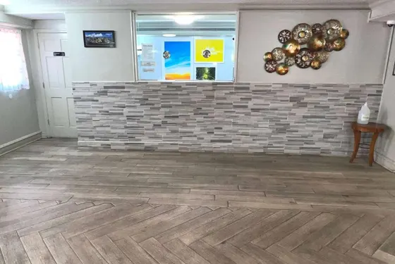 Living room with a brick fireplace with balloons