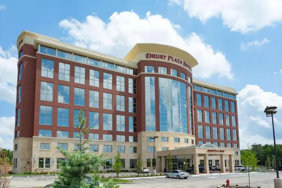 Brick Drury Plaza with a curved glass center