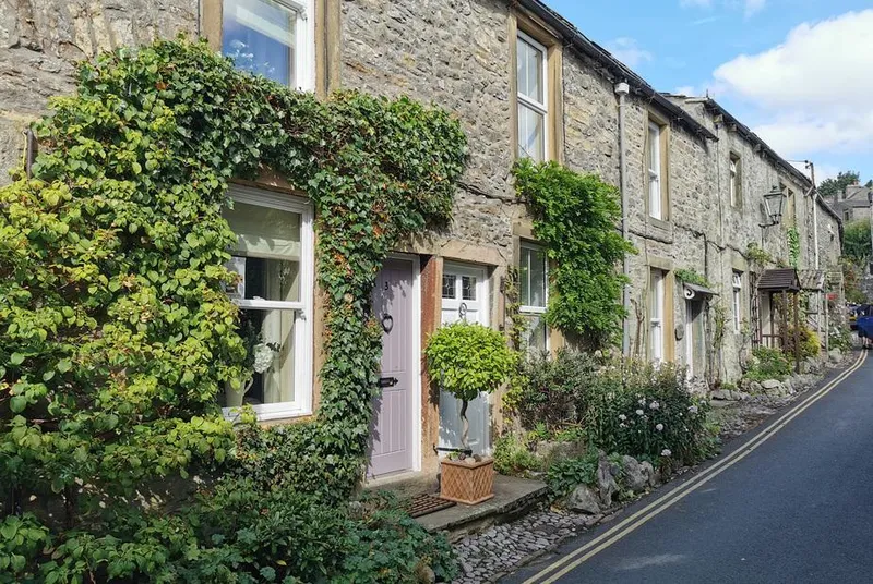 End Cottage ivy-covered stone cottage on Grassington village street