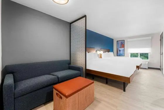 Hotel room with a bed and a couch
