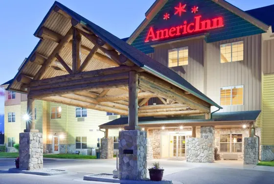 Inn with a sign on the front of it