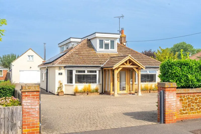 Grace Cottage Heacham front exterior with oak porch and dormer windows