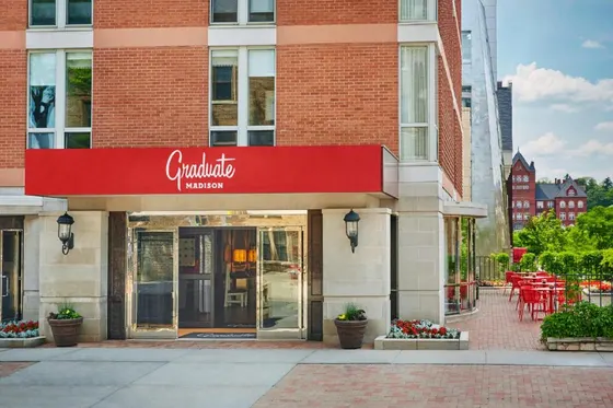 Store with a red sign on the front of a building