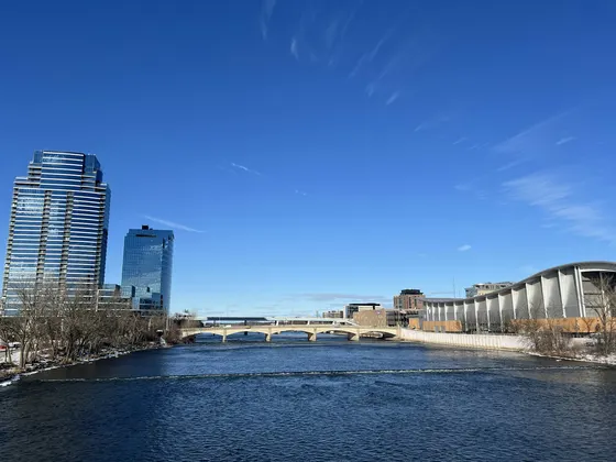 Grand River, bridges, and downtown Grand Rapids buildings on a winter day