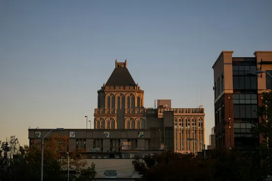 Downtown Greensboro's clock-topped tower in warm morning light