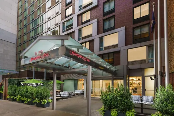 Bus stop in front of a building