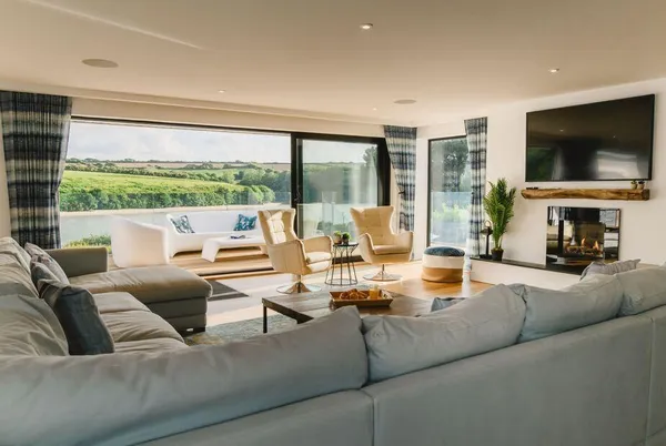 Heron House Newquay grand lounge with wide water views