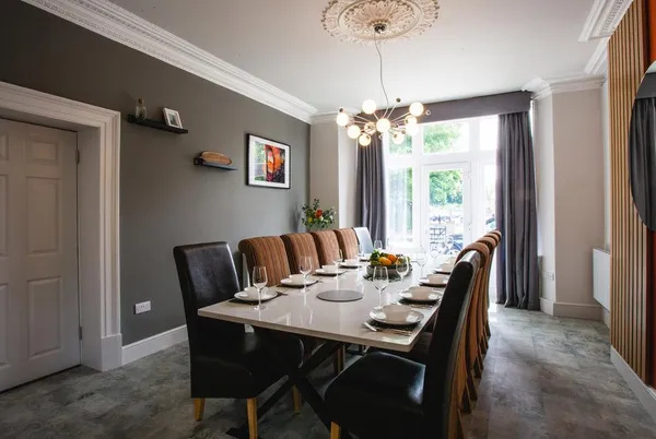 Herriots House dining room set for 12 with chandelier