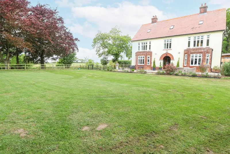 High House grand Edwardian facade with sweeping lawn