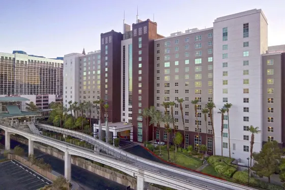 View of a city with buildings and a freeway