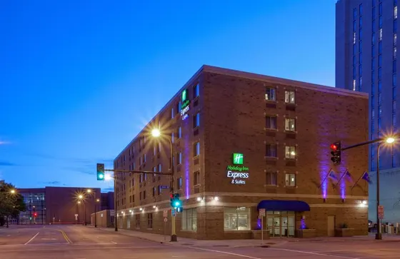 Brick hotel on a corner at dusk