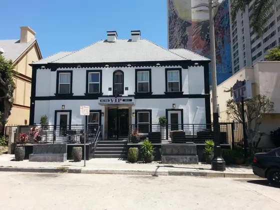 White building with a sign on it