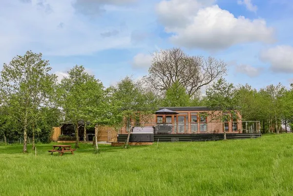 Holmside lodge in its meadow setting