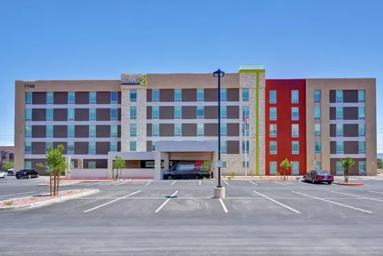 Parking lot in front of a large building
