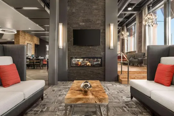 Living room with two couches and a fireplace