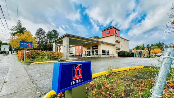 Building with a sign in front of it