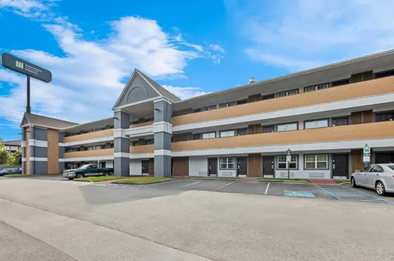 Empty parking lot in front of a building