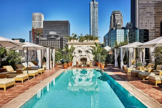 Swimming pool with a city skyline in the background