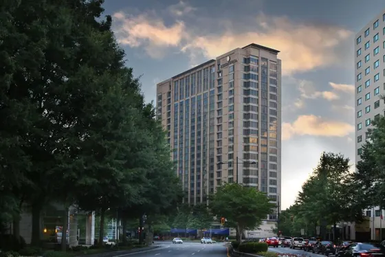 Tall building on the side of a street